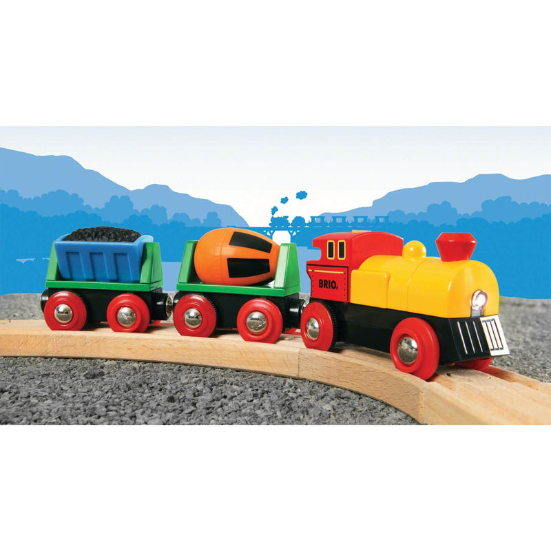 brio toy train in scene with two carriages