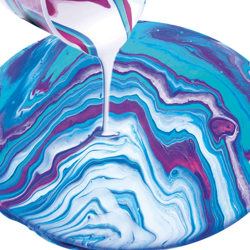 paint pouring into a purple blue and white pattern
