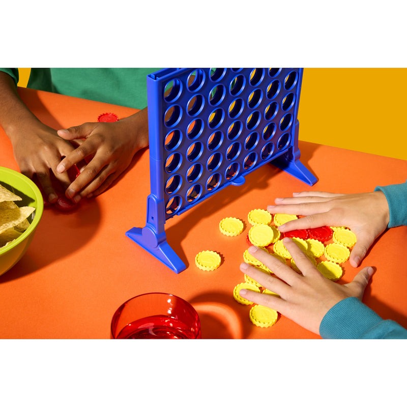 two people playing connect 4