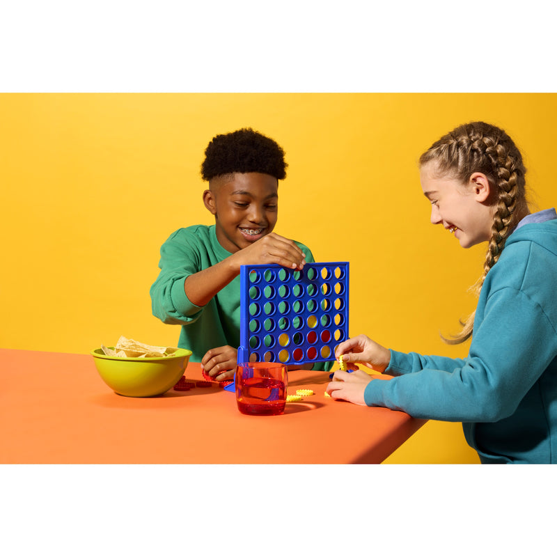 two children playing connect 4