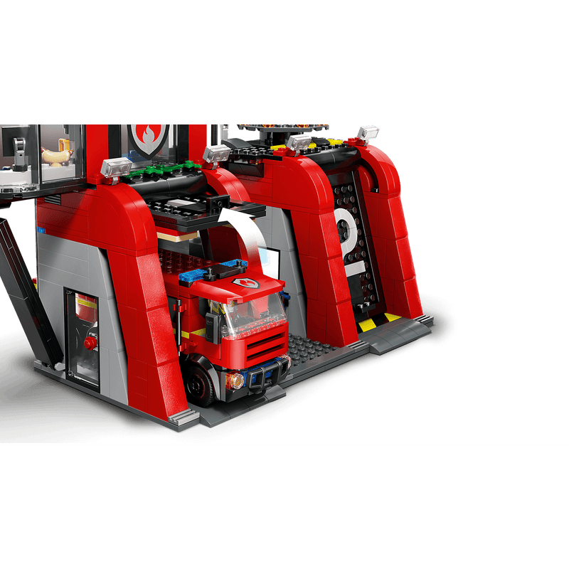 Close up image of lego fire engine in a fire station