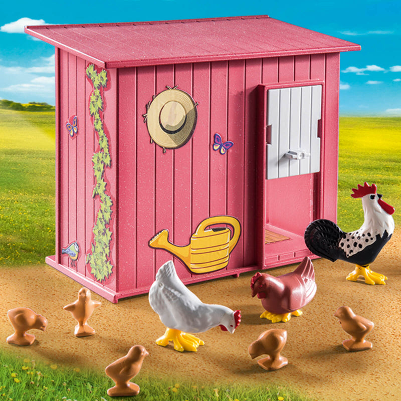 playmobil hen house with toy hens pecking on the floor