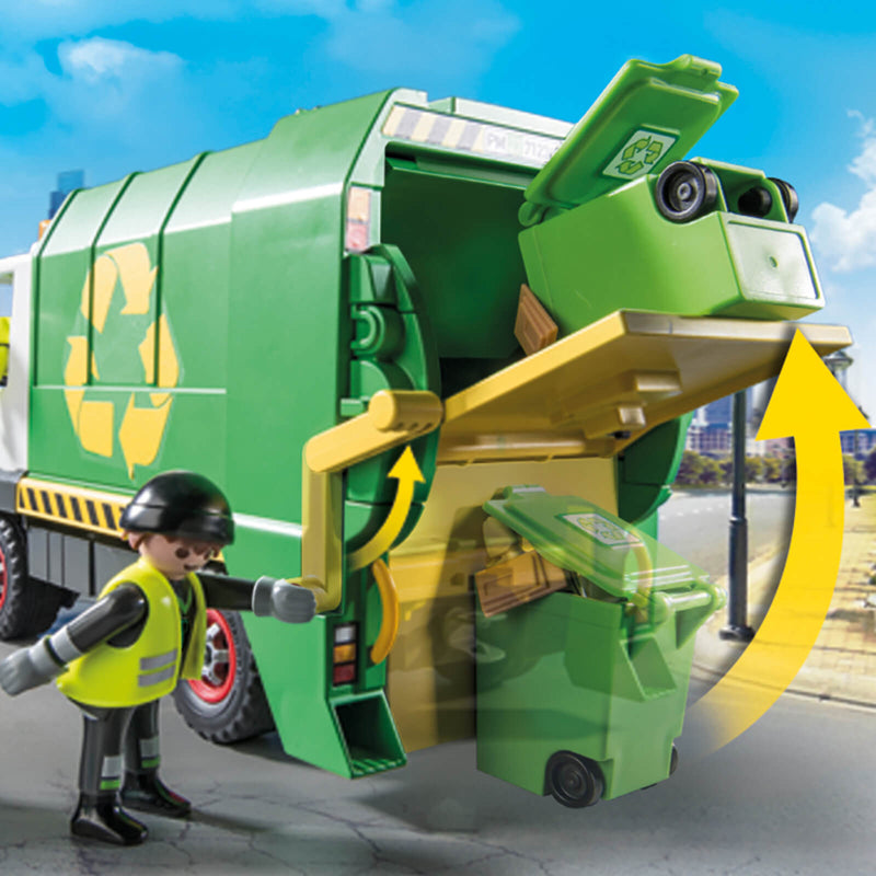 playmobil figure next to a working recycling truck