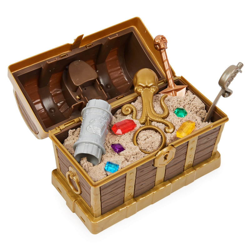 a treasure chest containing artifacts and brown kinetic sand
